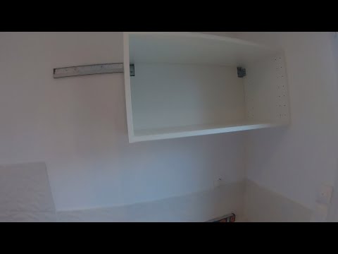 Vidéo: Rail de montage : fixer les armoires murales