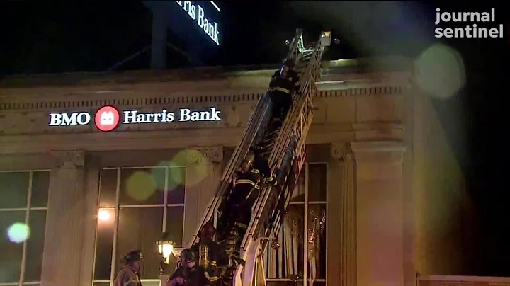 The Sherman Park civil unrest event: Firefighters work to put out bank fire