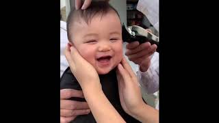 Baby laughing while having his first haircut || GoViral - Subscribe