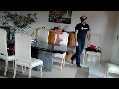 Shared robot hologram inside multiple HoloLens devices
