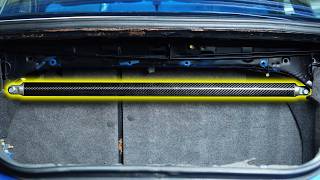 Rear CUSCO carbon strut bar for the GC8