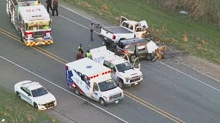 What caused the fatal Johnson County car collision that killed six, and injured three more?