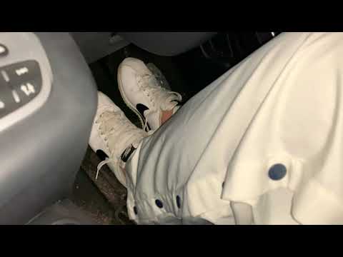 Kate is driving in Nike Cortez