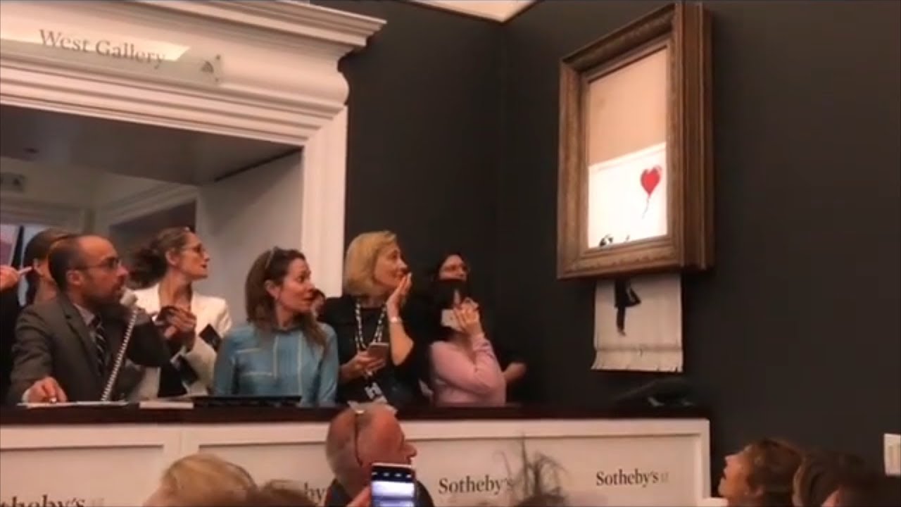 Banksy's painting Girl With Balloon selfdestructs at auction YouTube