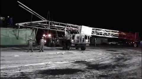 Drilling rig derrick lift by William Macphail