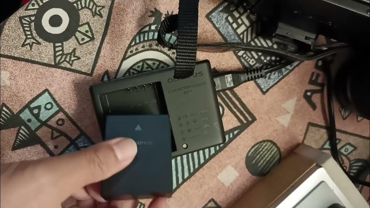 how to charge Olympus battery,i just upgraded my epl9 to Olympus omde