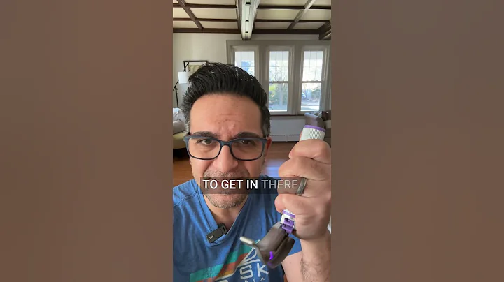 How do you hold your laryngoscope?