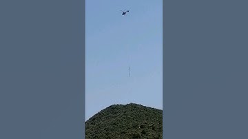 Helicopter transporting a log  #helicopter #travel  #transportation