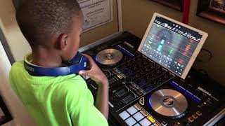 DJ Arch Jnr Messing Around With The Djay App & Reloop Mixon 4 Controller (7yrs old) screenshot 1