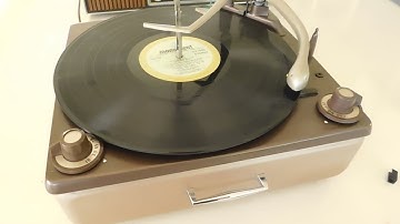 Zenith Cobra-Matic record changer playing a couple LP
