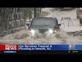 Car Becomes Trapped In Flooding In Newark, NJ