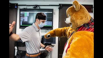 Machine Learning of Robot Hugging Behaviors in Time and Space
