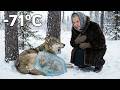 A Wolf Cub Froze to the Ice Beside Its Mother… Then an Old Woman Saved It!