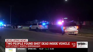 Two people found shot dead inside vehicle