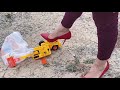 Sadaf crushing toys under her car  crushing things with her high heels