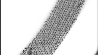 Lateral Migration of a Single bubble in Sheared Two-dimensional foam