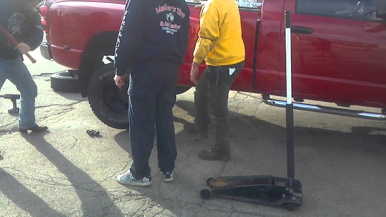 I took the lug nuts off and the wheel still won't come loose...so