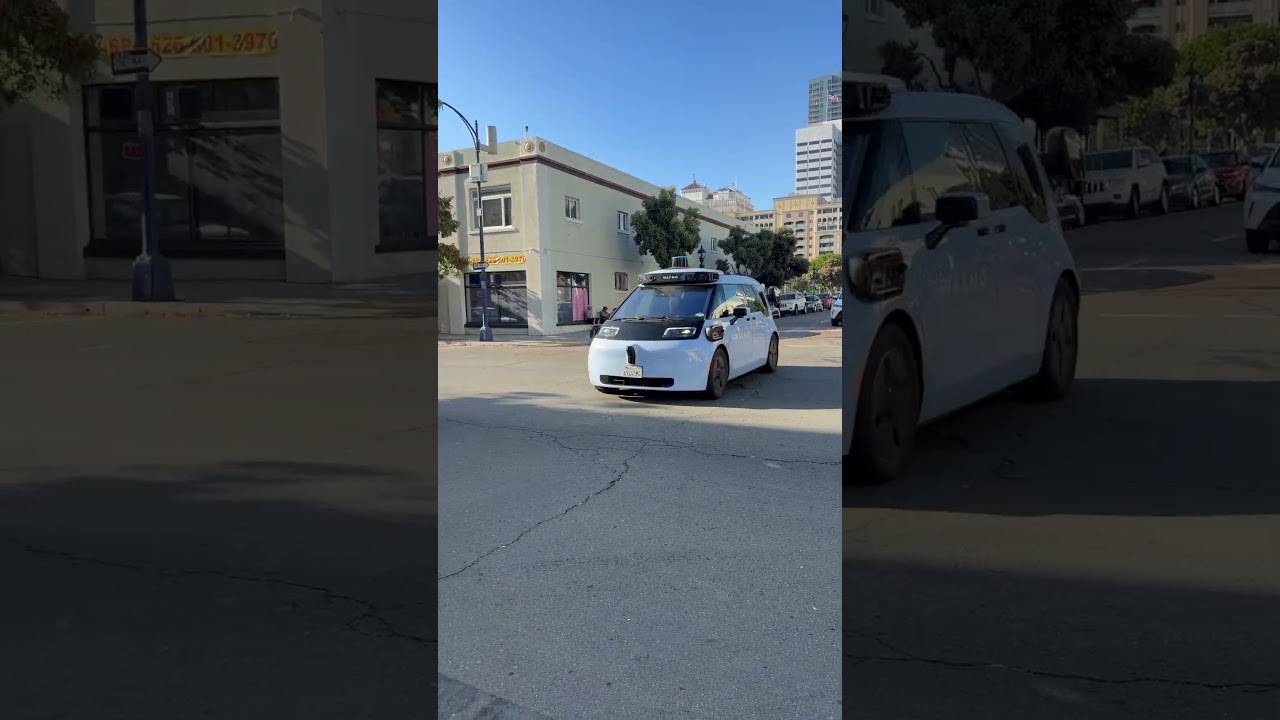 Driverless Waymo Robotaxi Driving Through Downtown San Diego