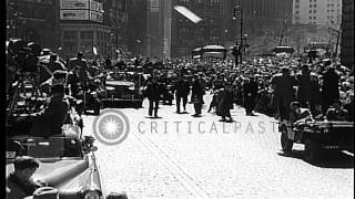 Motorcade of General Douglas MacArthur as he is welcomed in ticker tape parade in...HD Stock Footage