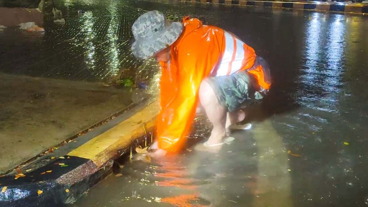 Activity After Heavy Rain Remove Trash Clogged Culvert Drain On Street ...
