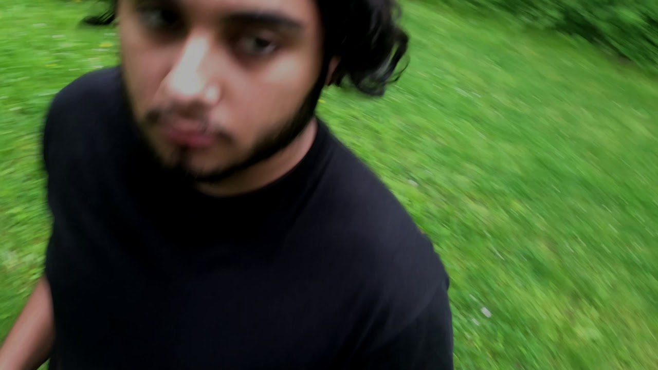 shooting a crossbow in the forest 
