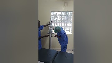 Takagi OM9 microscope movement features.