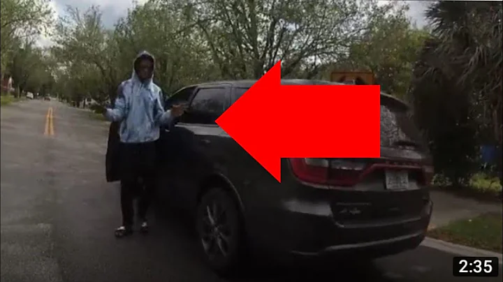 FOOLIO SLAMMED AGAINST CAR BY POLICE IN POLICE BODY CAM FOOTAGE.  SEARCHED BY JSO