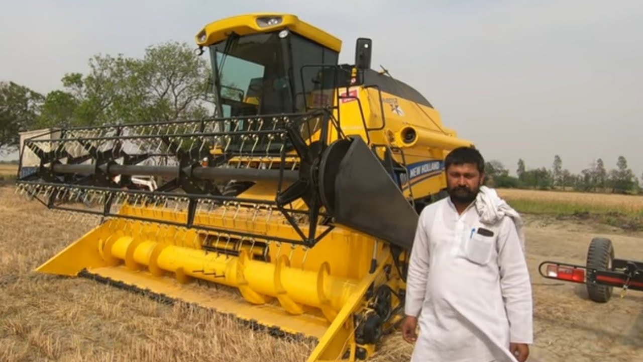 काम और चलाने में लाभ है इसलिए दूसरी लेकर आया New Holland TC5.30 CAB RN harvester review by Hariom