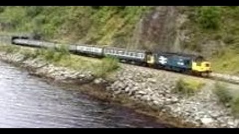Passenger Train On Dingwall To Skye Railway Line On History Visit To Highlands Of Scotland