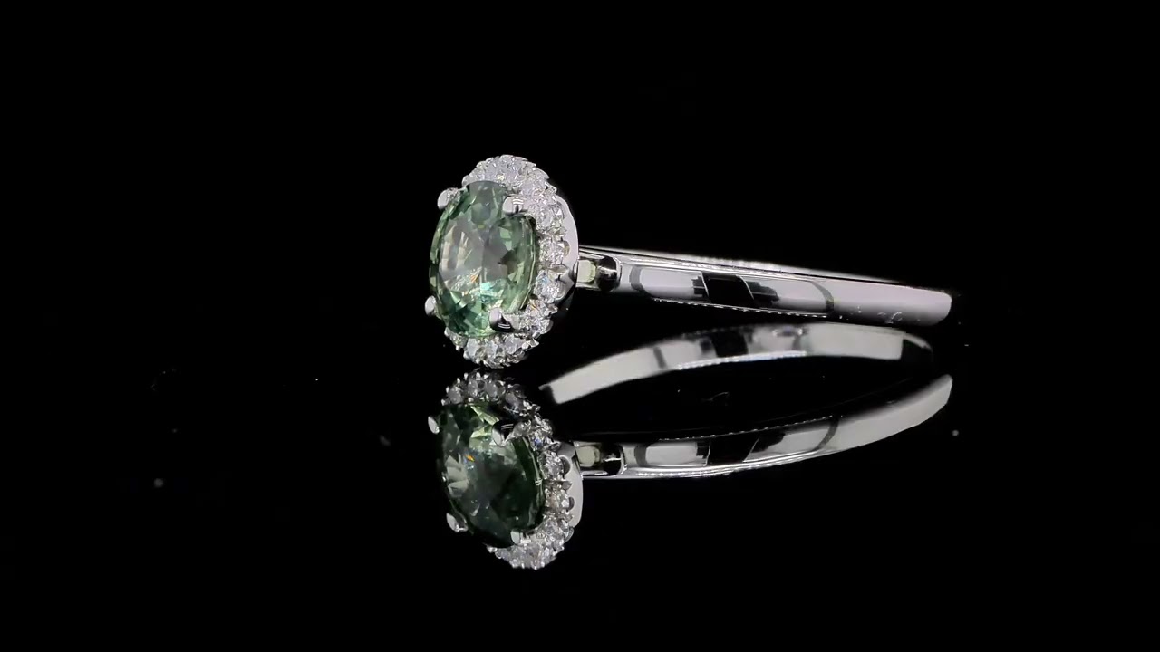 Green Sapphire Halo Ring In 18K White Gold With Diamond Pavé Detail - Orogem Jewelers