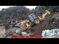 JCB Backhoe -Cutting soil Hill For Narrow Road Skilled Operator