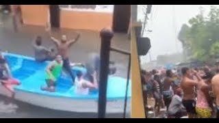 Residentes de Villa Juana hacen "Teteo" y salen con yates a las calles en  tormenta Franklin