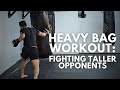 11 min beginner heavy bag workout for fighting taller opponents