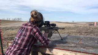 Keisha shooting a .50 cal in slo mo