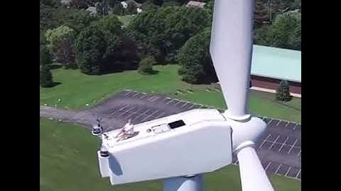 Drone catches man sun bathing on wind turbine 😭
