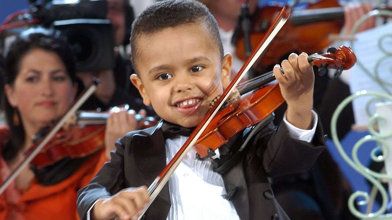 ⁣André Rieu & 3 year old Akim Camara