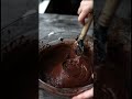 Angry baker makes a dark chocolate cake with red wine chocolate glaze.