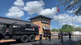 Customers observe National Anthem at Mission Barbecue