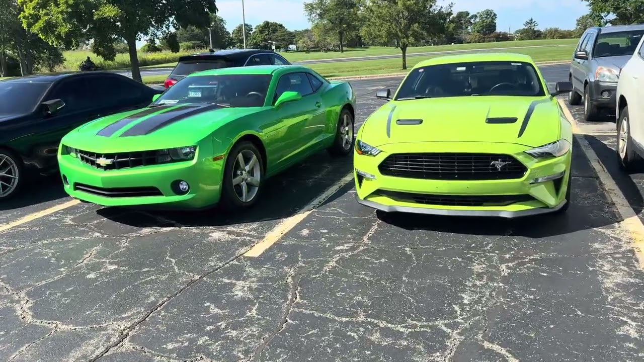 Green camaro or neon mustang which one are you choosing for a race?