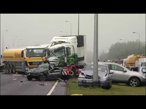 One dead in massive pile-up