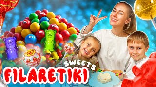 There are a lot of sweets, and the brother and sister are trying to share them! Filaretiki Best