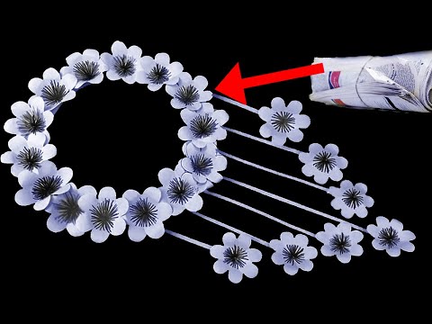 newspaper​-flowers.daisies.-paper-craft-ideas-for-kids.-newspaper-craft.