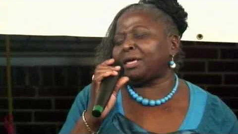 Bertha Cook sings "Walk With Me, Lord"