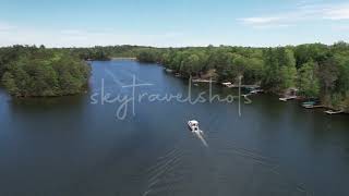 Sunlit Sailing Drone Views Over Minocqua Lake, WI | 4K Aerial Footage Downloadable