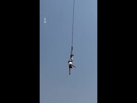 Horror moment tourists bungee cord snaps