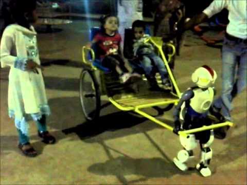 Humanoid robot pulling a carriage!