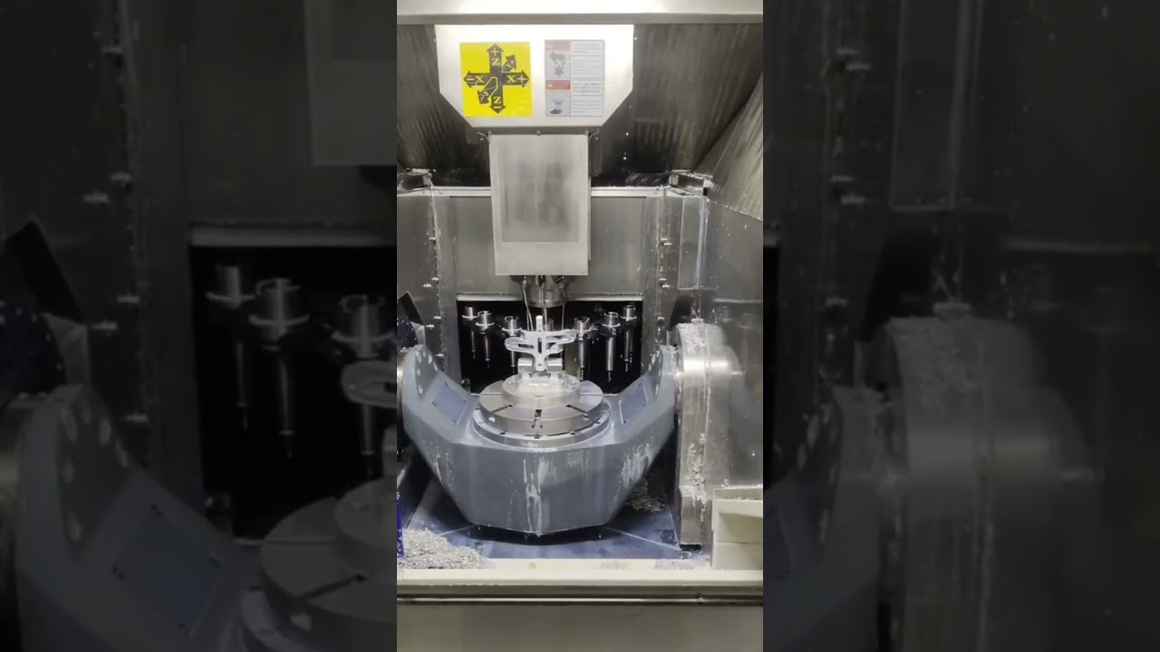 How a Five-Axis Machining Center Cuts Complex Parts with No Repositioning!"