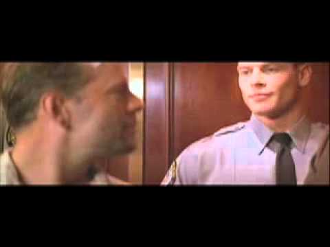 Bruce is in an elevator with security guys