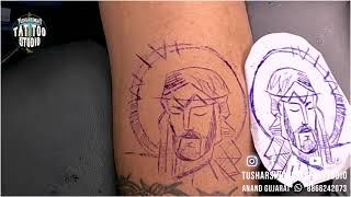 Divine Line Art: Jesus Face Tattoo at Tushar Singh's Tattoo Studio