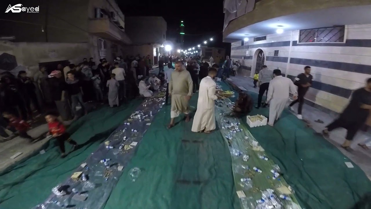 تجهيز أطول مائدة طعام في سوريا مدينة حماه حي الضاهرية بمناسبة المولد النبوي الشريف ج4